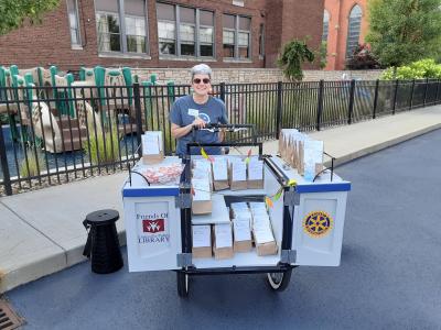 Patty Burns with the Book Bike at Louisville Downtown Market Days